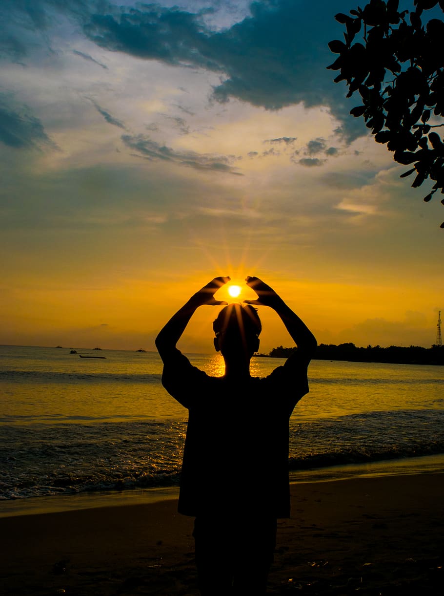 Silhouette Photo of Person Raising Hands, backlit, beach, clouds HD wallpaper