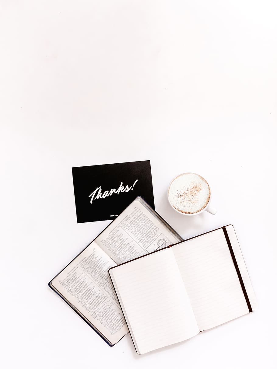 two book pages, white background, studio shot, paper, coffee HD wallpaper