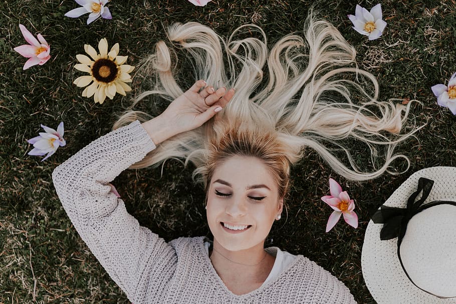 Woman Lying on Flowers, adult, beach hat, beautiful, blonde, break time, HD wallpaper