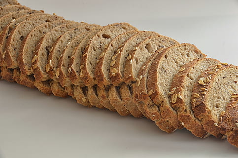 Sliced on Bread on White Surfcae, baking, cereal, close-up, delicious HD wallpaper