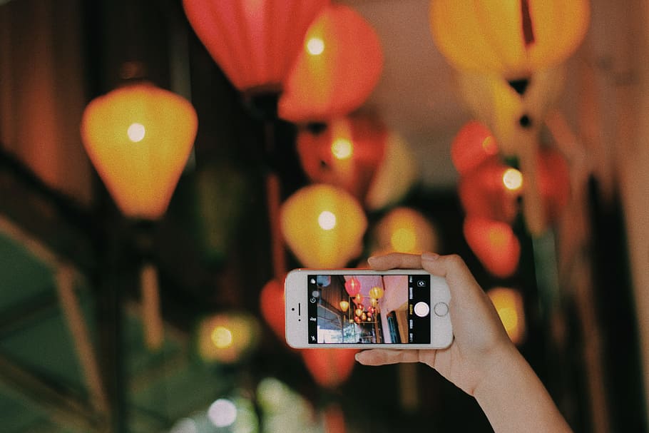person taking photo of pendant lamps using iPhone, hand, camera HD wallpaper