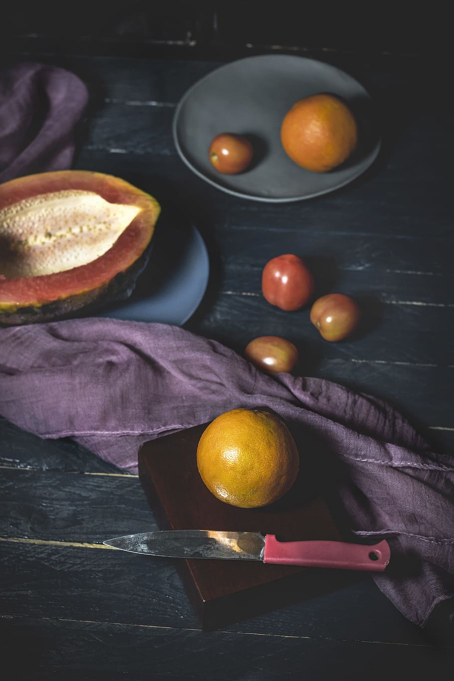 fruits near red and gray knife on wood, papaya, fresh fruit, vegetable HD wallpaper