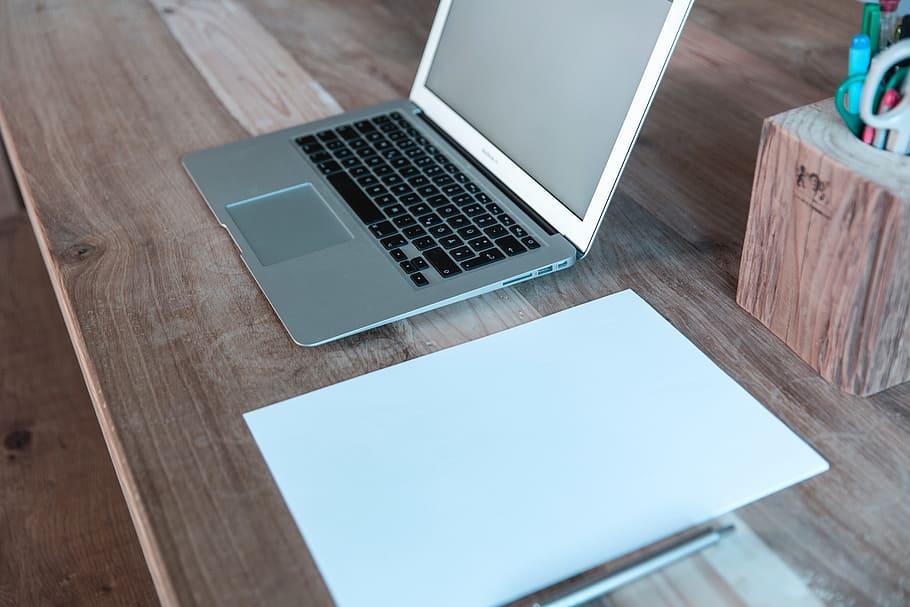 macbook air, laptop, computer, technology, paper, pen, wood HD wallpaper