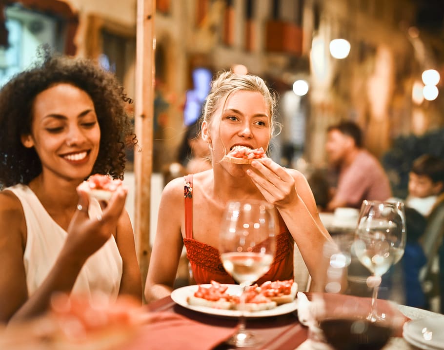 Woman Eating Bruschetta, adult, bar, beautiful, biting, black