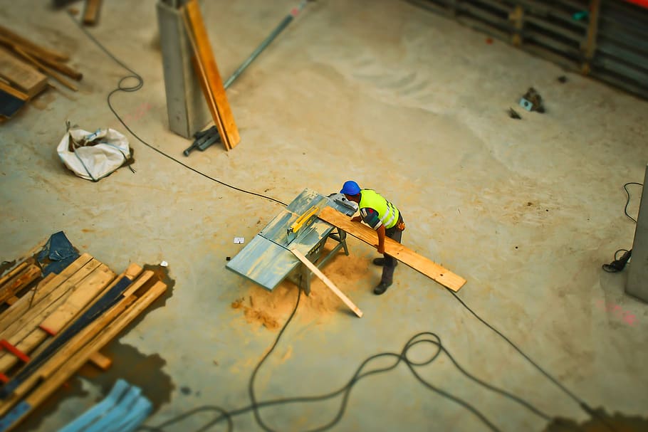 Person Cutting Wood on Table Saw during Daytime, build, builder HD wallpaper