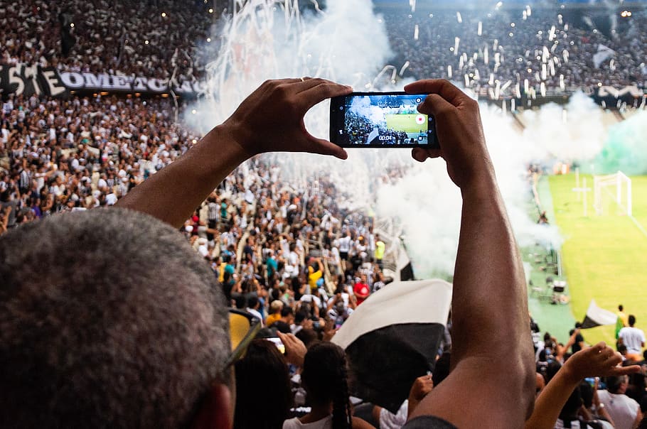 Person Taking Photo of Stage Stadium Presentation, audience, bleachers HD wallpaper