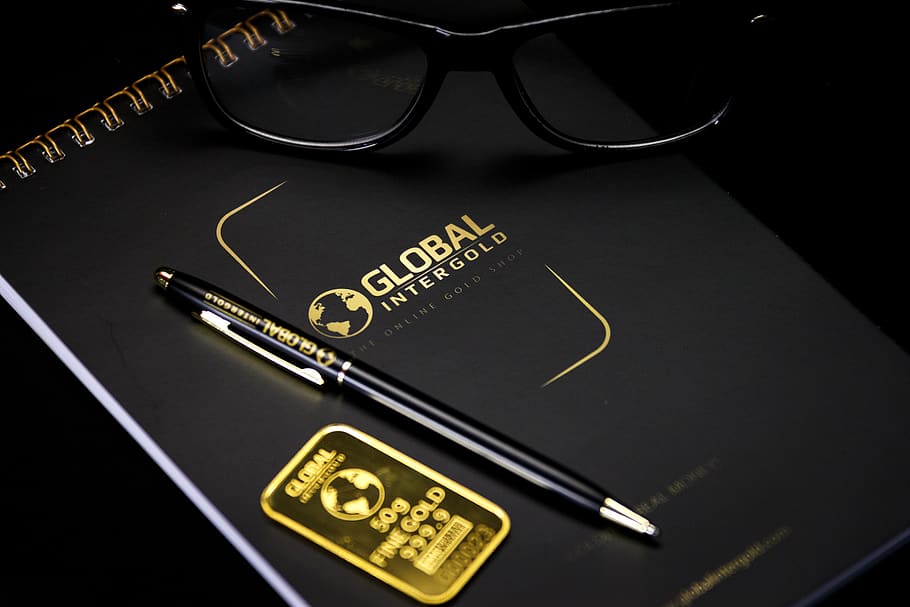 notebook, black, pen, eyeglasses, gold, sticker, logo, office HD wallpaper