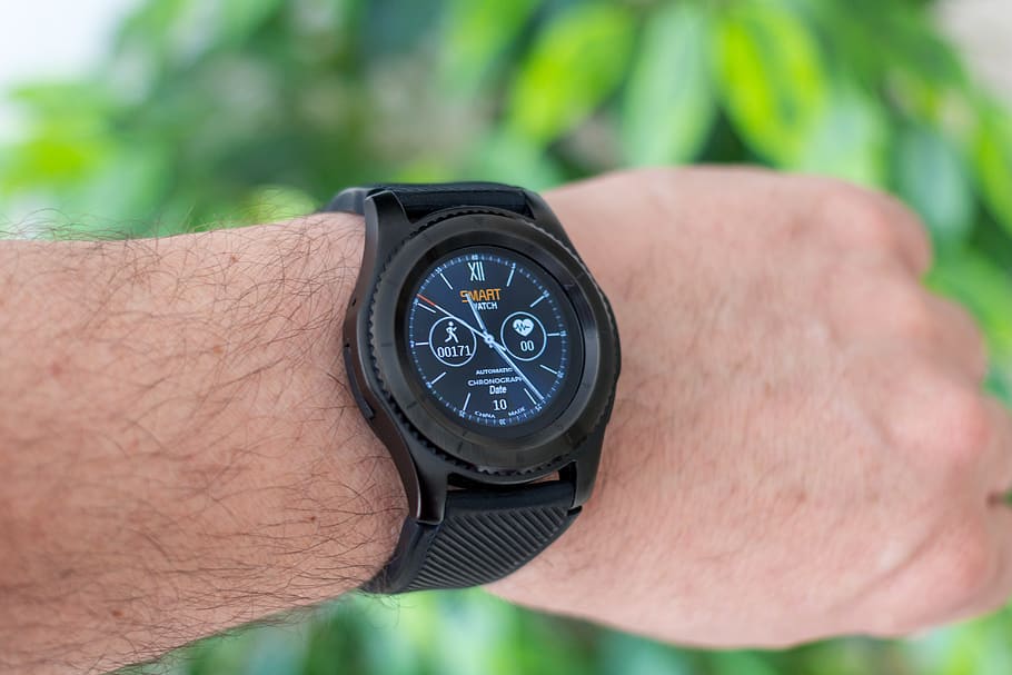 person wearing black smartwatch, wristwatch, digital watch, hand, HD wallpaper