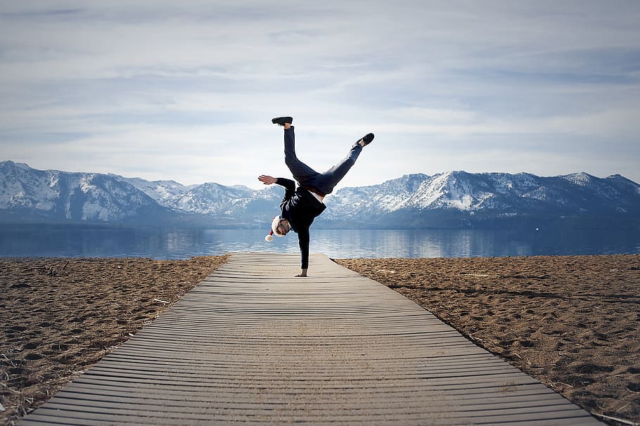 person doing one stand, mountain, one person, full length, sky HD wallpaper