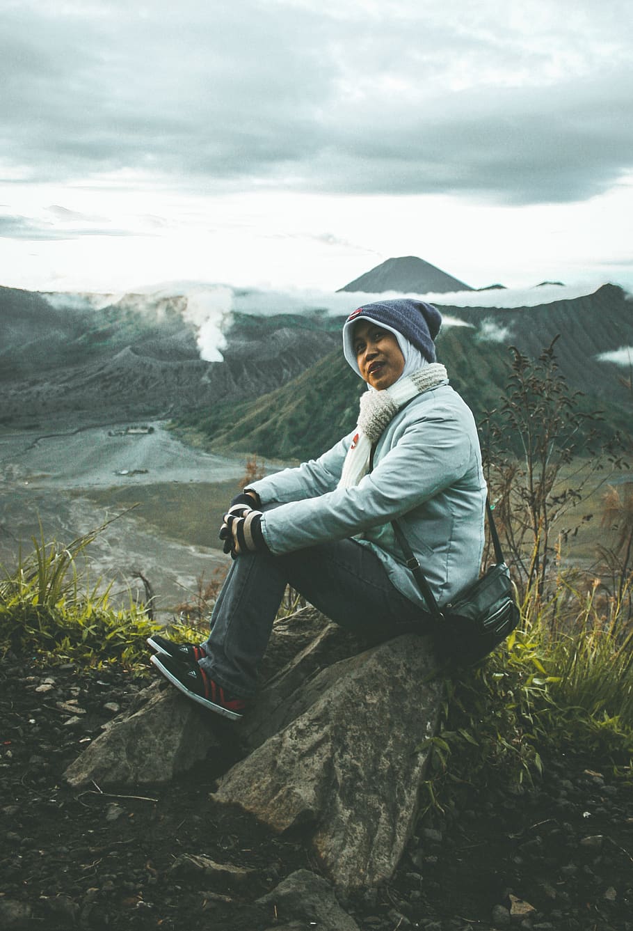 man sitting on rock formation, clothing, apparel, outdoors, human HD wallpaper