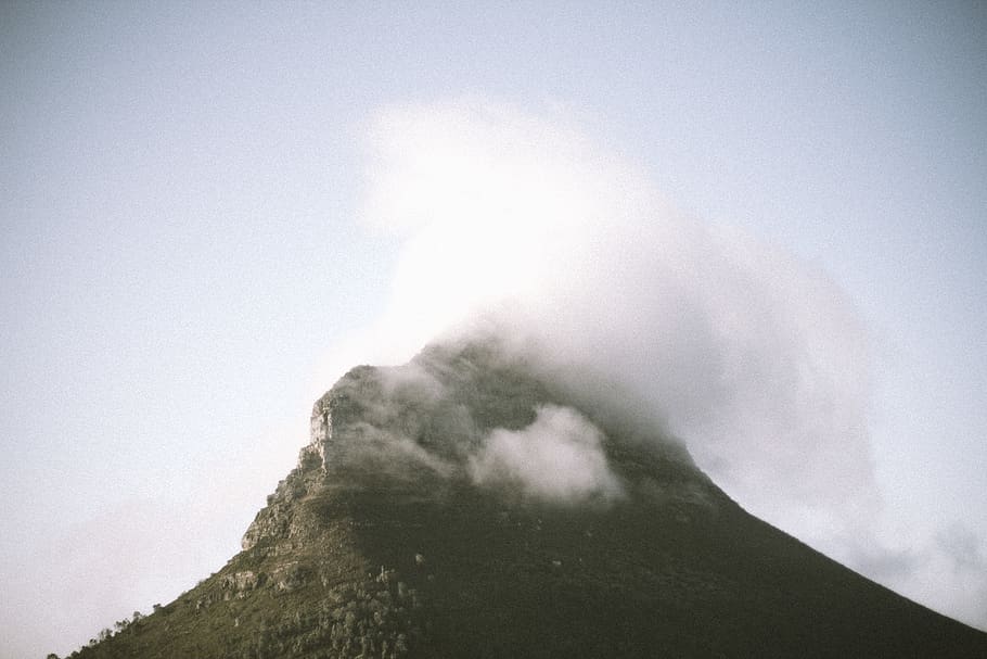 mountain emitting smoke, cape town, signal hill, south africa