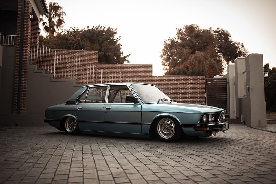 parked blue sedan, vehicle, coupe, transportation, sports car HD wallpaper