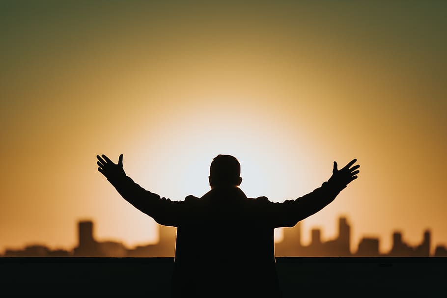 man raising both hands, silhouette, sunset, sky, human arm, one person HD wallpaper