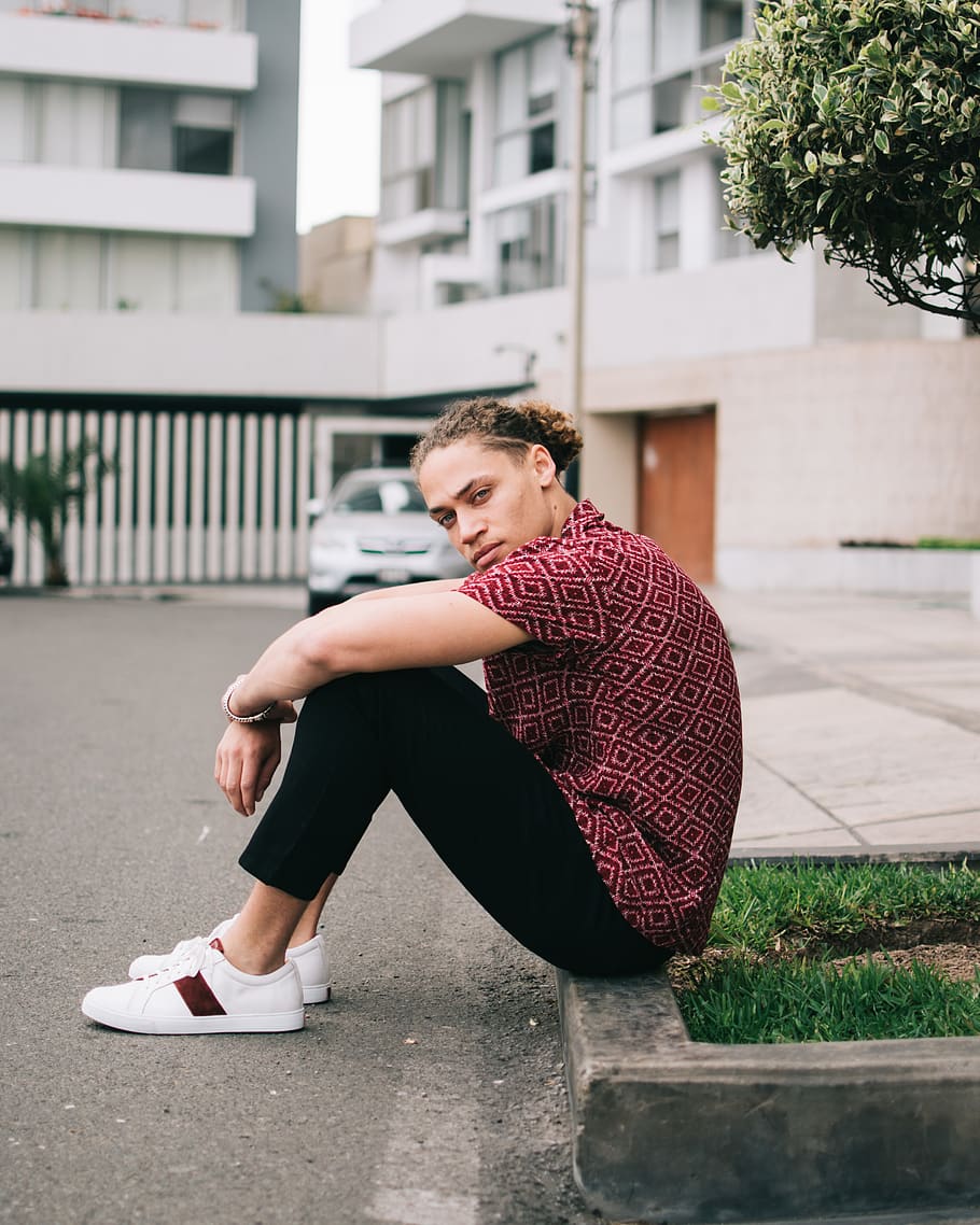 man sitting on ground, apparel, clothing, shoe, footwear, human HD wallpaper