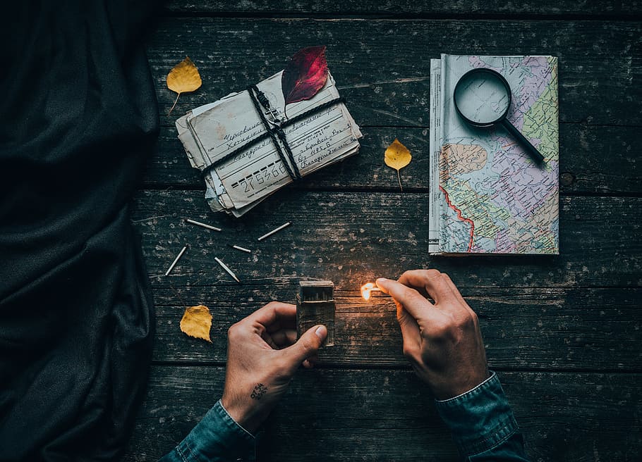 person holding lighted safety match, hand, travel, explore, map HD wallpaper