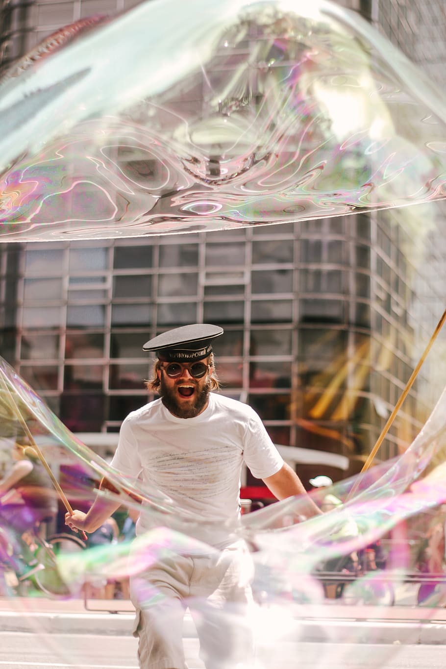 Man Wearing Black Hat, bubble, fun, person, street, real people HD wallpaper
