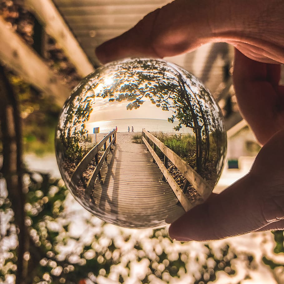 Shallow Focus Photo Of Glass Ball, ball-shaped, beach, hand, macro HD wallpaper