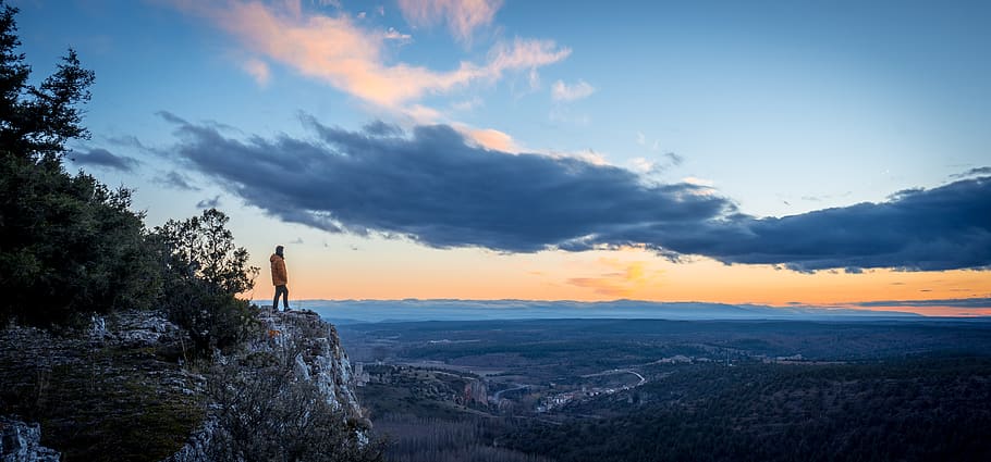 person standing on cliff, nature, outdoors, human, mountain, sky HD wallpaper