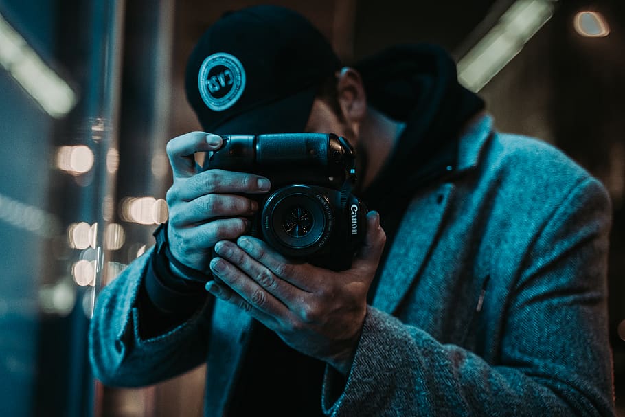 man in black cap holding camera, photography themes, camera - photographic equipment HD wallpaper