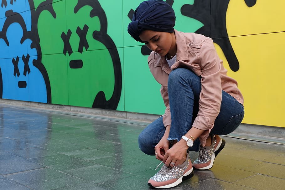 Photo of Woman Tying Her Shoes, adult, attractive, beautiful