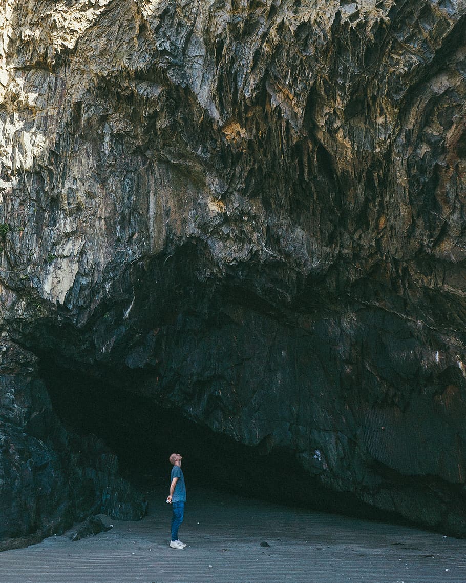 man standing on rock, real people, one person, rock - object HD wallpaper