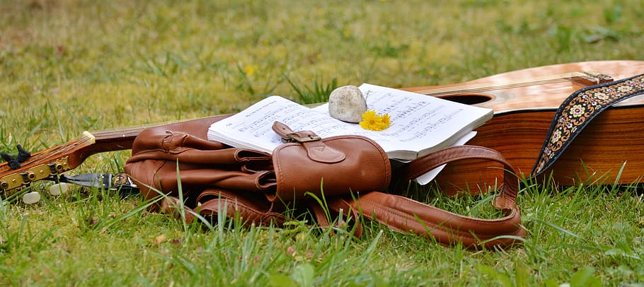 Brown Leather Bucket Bag, backpack, field, grass, guitar, lawn HD wallpaper