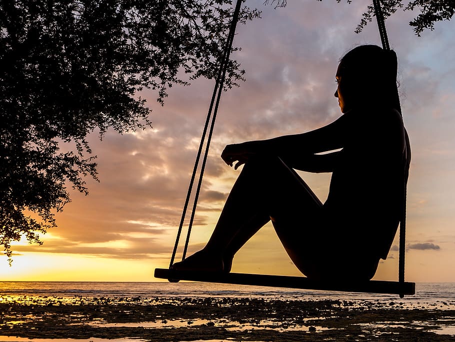 Silhouette of Woman on Swing during Golden Hour, backlit, beach HD wallpaper