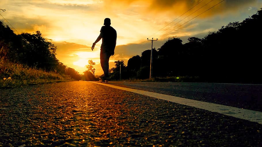 Silhouette Photo Of Man Riding Skateboard, backlit, dawn, dusk HD wallpaper