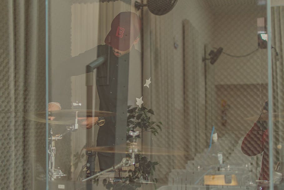 Man Standing Front of Drum in Room, daylight, drums, glass, outdoors HD wallpaper