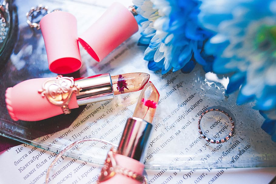 two clear and red lipsticks, no people, close-up, still life HD wallpaper