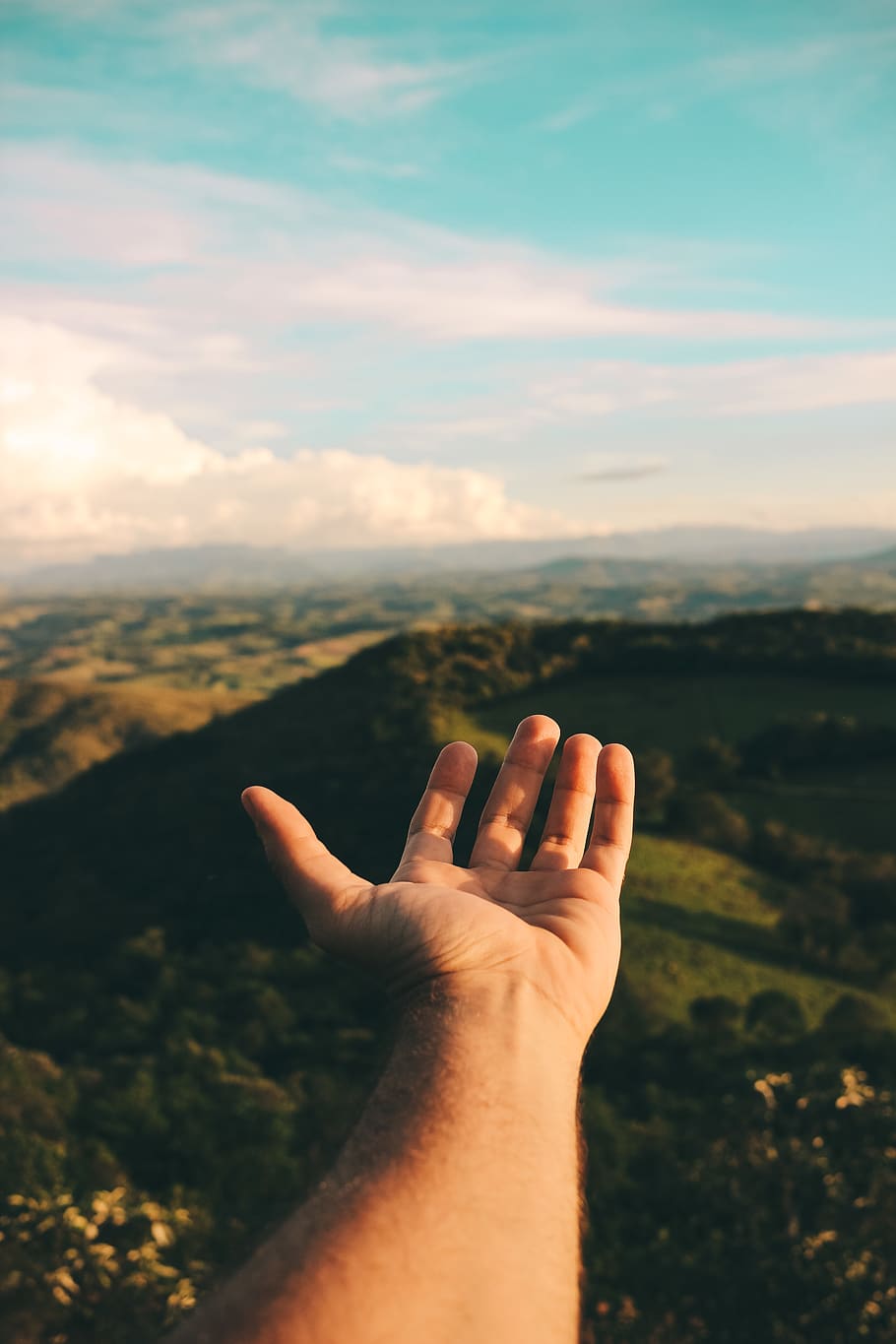 Person's Left Hand, clouds, daylight, green, landscape, mountains HD wallpaper