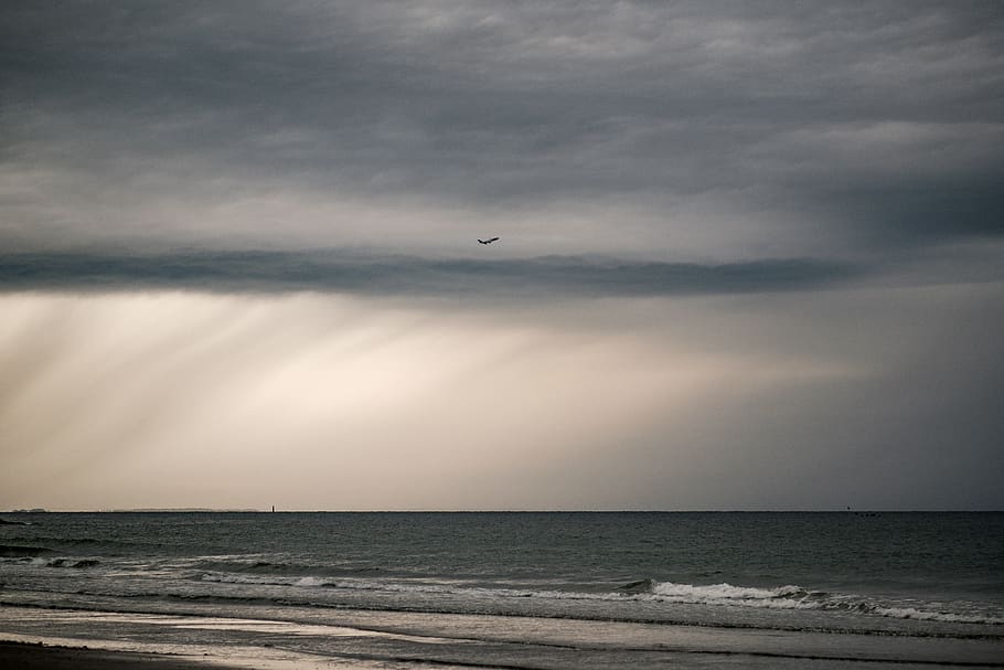 clouds, rain, ocean, plan, air, lighthouse, waves, water, sky HD wallpaper