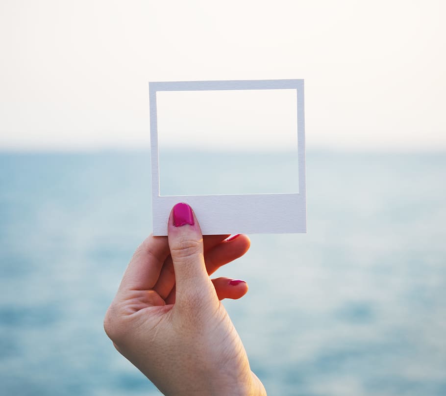 Person Holding Square White Paper, beach, frame, hand, macro HD wallpaper