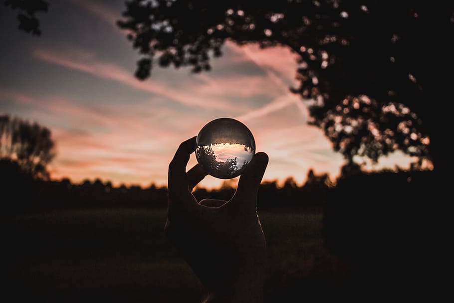 sunset, lensball, woods, trees, hadn, sky, pink, clouds, one person HD wallpaper