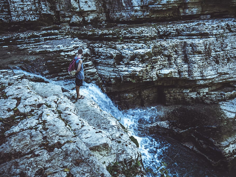 Man Standing in Waterfalls, adventure, environment, exploration HD wallpaper