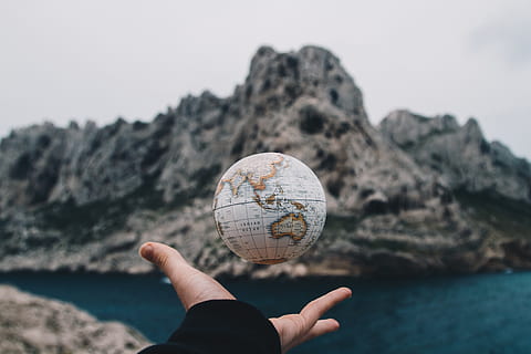 Person Tossing Globe, float, floating, hand, levitation, macro HD wallpaper