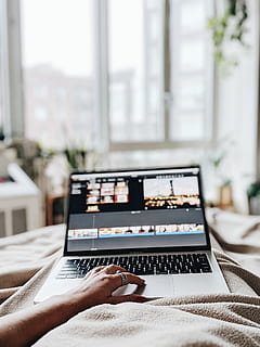 person using silver laptop computer inside bedroom, pc, electronics HD wallpaper