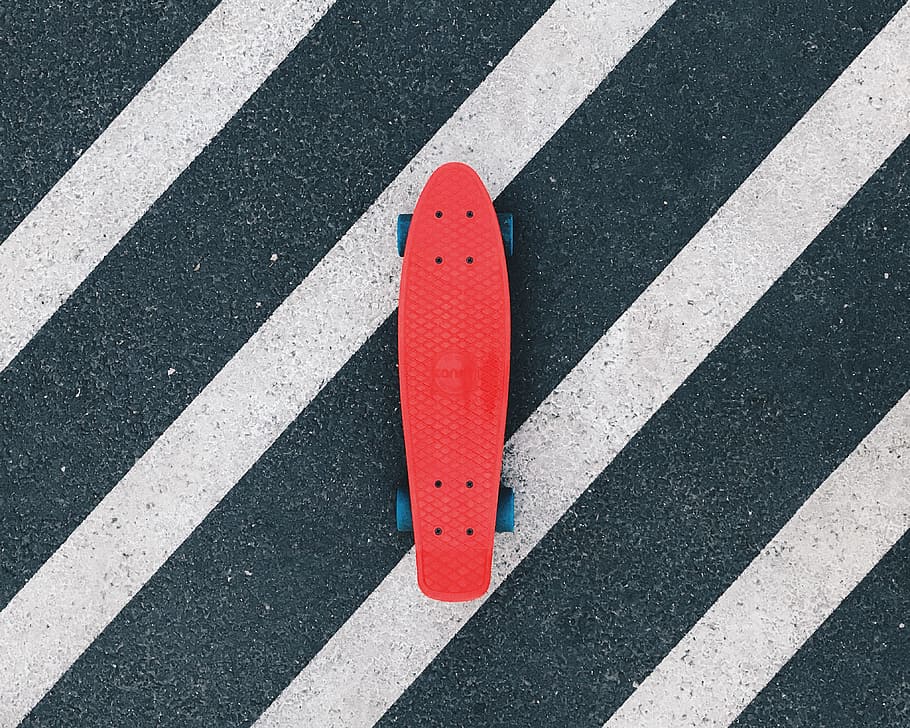 red cruiserboard on gray and white pedestrian lane, skateboard HD wallpaper