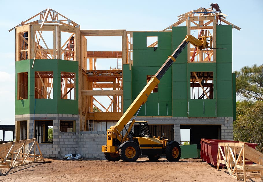 Yellow and Black Heavy Equipment Near Unfinished Building, architecture HD wallpaper