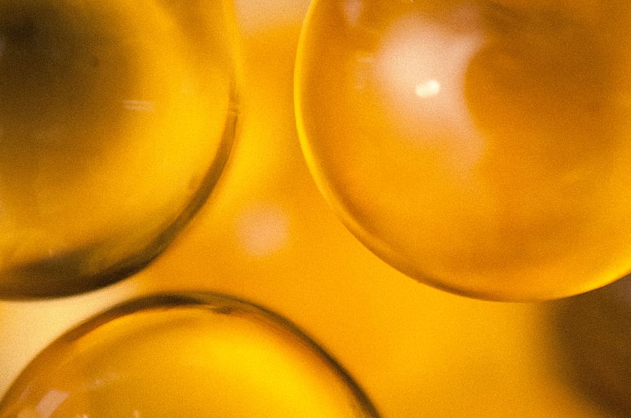 closeup, close-up, fish-oils, yellow, no people, indoors, backgrounds HD wallpaper
