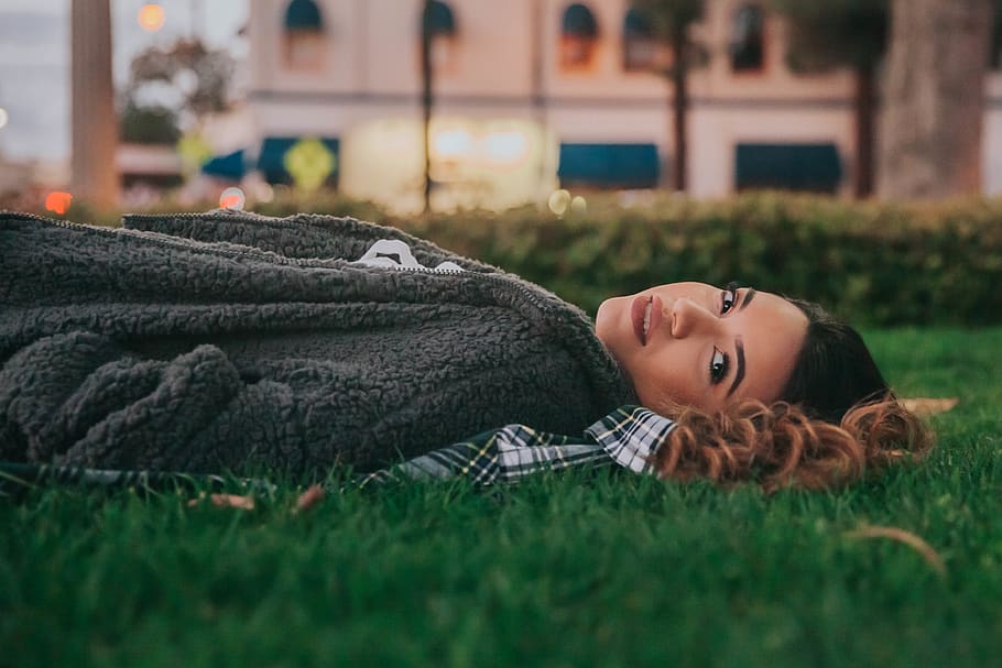 woman laying down on grass, plant, clothing, apparel, human, person HD wallpaper