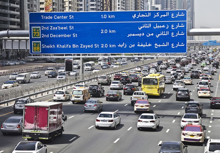 Road signs showing distance for Sheikh Zayed Road and Trade Center In Dubai ,United Arab Emirates, HD wallpaper