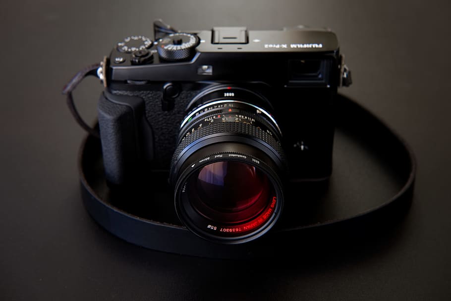 black DSLR camera on black surface, lens, tech, gear, fuji, film HD wallpaper