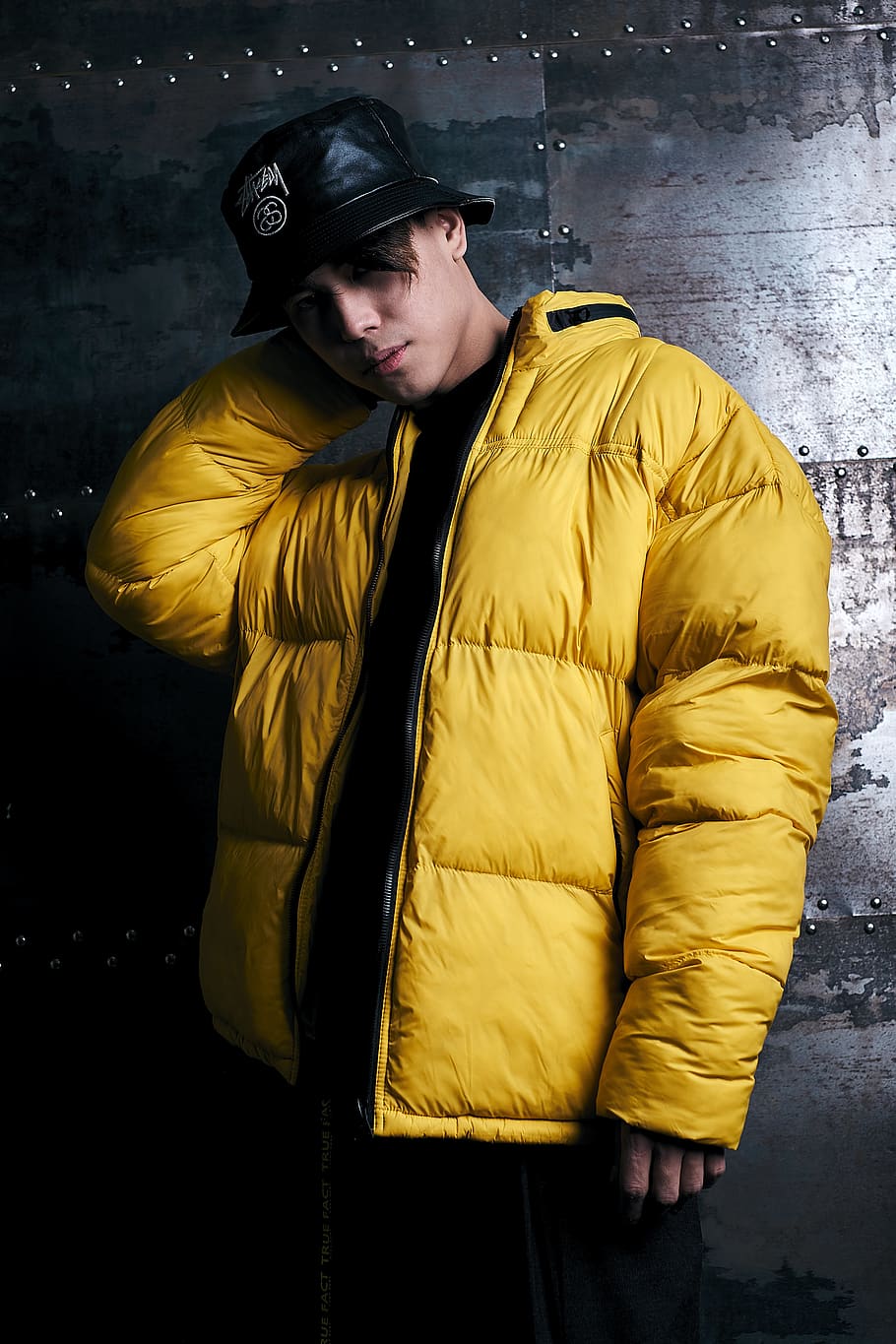 man wearing yellow zip-up jacket, one person, real people, clothing