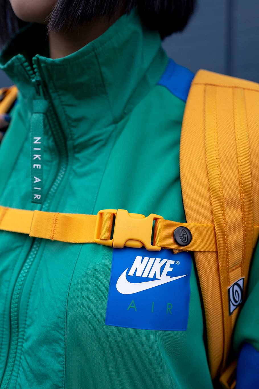 Woman in Green Jacket Carrying Backpack, adolescent, blue, bright colours HD wallpaper