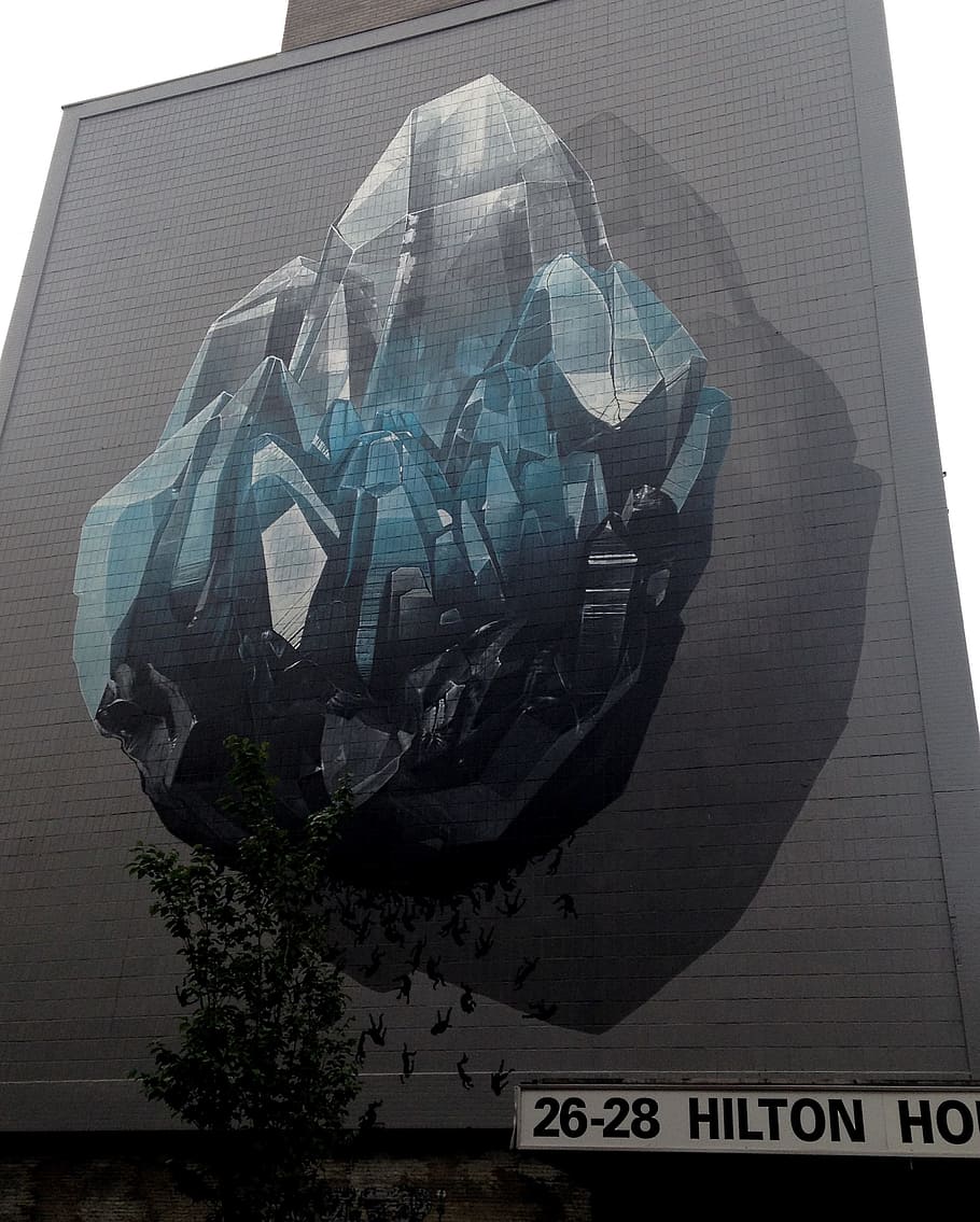 Enormous piece of street art on the side of a tower block in Manchester's Northern Quarter.