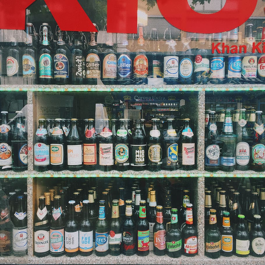 assorted beverage bottles on display, beer, alcohol, drink, beer bottle HD wallpaper