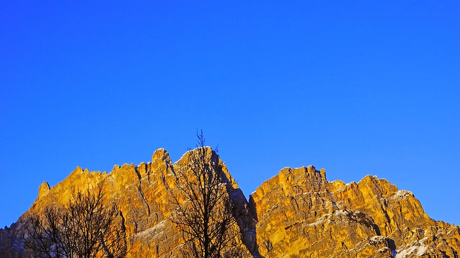 brown montain, nature, outdoors, mountain range, peak, cliff HD wallpaper