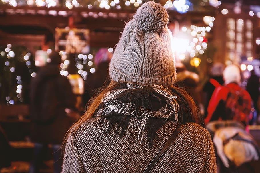 Girl from back on background illumination glow bokeh light in night HD wallpaper