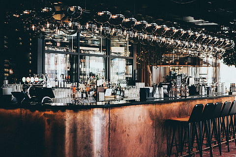 bottles in display cabinet, pub, bar counter, denmark, copenhagen HD wallpaper